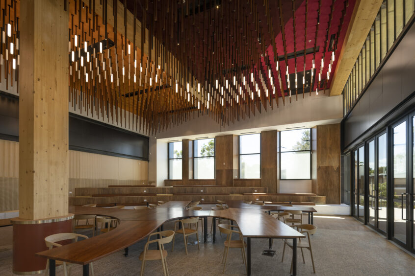 A ribbon wraps around this space, creating a place for digital artworks and important messages to be broadcast.